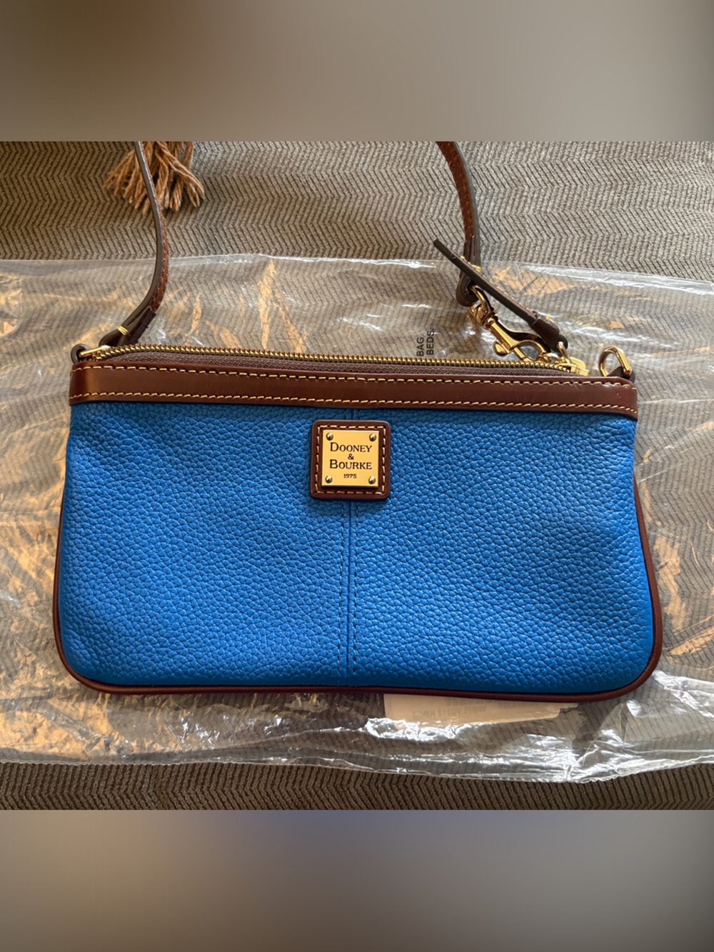 Dooney & Bourke Blue Pebbled Leather Wristlet with Brown Trim